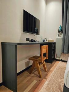 TV a/nebo společenská místnost v ubytování Carnarvon Suites By Reunion