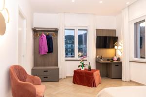 TV a/nebo společenská místnost v ubytování Patriziella 4 Rooms