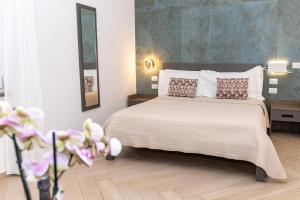 Postel nebo postele na pokoji v ubytování Patriziella 4 Rooms