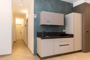 Kuchyň nebo kuchyňský kout v ubytování Patriziella 4 Rooms