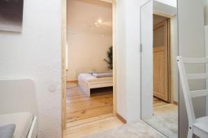 Postel nebo postele na pokoji v ubytování Apartmenthaus ROSE