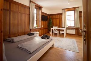 Postel nebo postele na pokoji v ubytování Apartmenthaus ROSE
