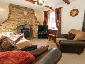 Et opholdsområde på Anchor Cottage