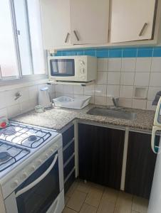 Η κουζίνα ή μικρή κουζίνα στο Murakami depto MDP