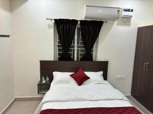 Postel nebo postele na pokoji v ubytování PS Elite Homestay