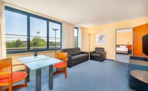 Predel za sedenje v nastanitvi Radisson Blu Fürst Leopold Hotel