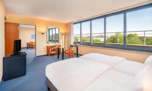 Postelja oz. postelje v sobi nastanitve Radisson Blu Fürst Leopold Hotel