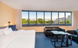 Postelja oz. postelje v sobi nastanitve Radisson Blu Fürst Leopold Hotel