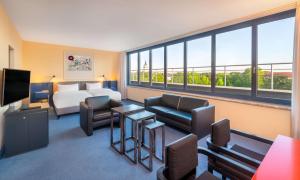 Postelja oz. postelje v sobi nastanitve Radisson Blu Fürst Leopold Hotel