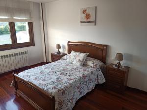 Łóżko lub łóżka w pokoju w obiekcie Sandino 32