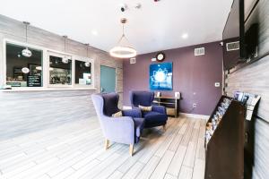 TV a/nebo společenská místnost v ubytování Hotel Blue Spring