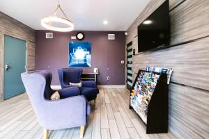 TV a/nebo společenská místnost v ubytování Hotel Blue Spring