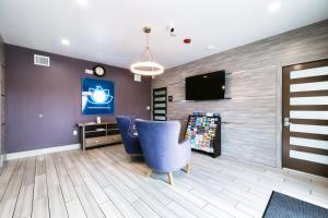TV a/nebo společenská místnost v ubytování Hotel Blue Spring