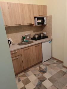 Η κουζίνα ή μικρή κουζίνα στο Chruścielówka ap nr 3