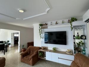 TV a/nebo společenská místnost v ubytování Casa palma Cartagena de Indias, Colombia