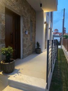 Balkón nebo terasa v ubytování Αura Luxury Apartments