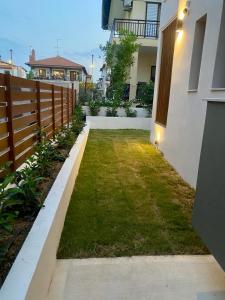 Zahrada ubytování Αura Luxury Apartments