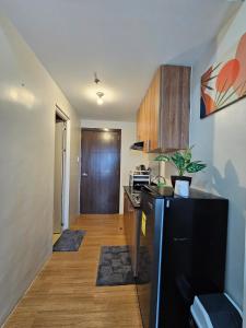 Cucina o angolo cottura di The Loop 2203 - Goff's Place