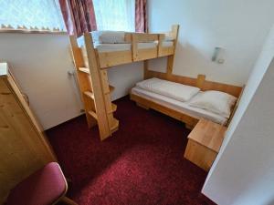 Łóżko lub łóżka w pokoju w obiekcie Pension Appartement Ambrosi
