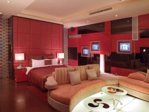 TV a/nebo společenská místnost v ubytování Discovery Motel - Zhonghe