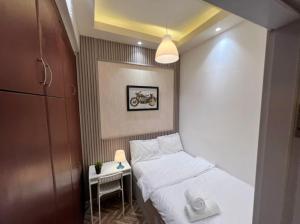 Ένα ή περισσότερα κρεβάτια σε δωμάτιο στο Network Partition Room Near Internet City Metro +49 φωτογραφίες