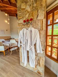 Кровать или кровати в номере Chalé Aurora do Pinhal