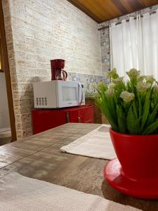 Nhà bếp/bếp nhỏ tại Chalé Safira