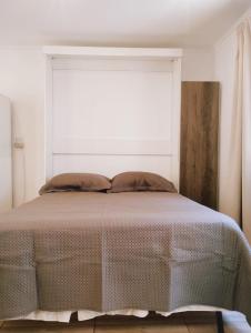 Una cama o camas en una habitación de Atlántida A 700 m del Mar Santa Clara del Mar