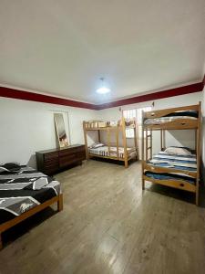 A bed or beds in a room at Hostel rivendell lima