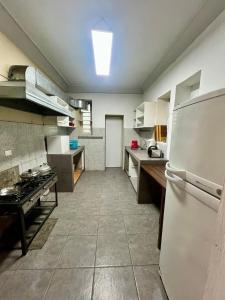 A kitchen or kitchenette at Hostel rivendell lima