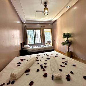 Postel nebo postele na pokoji v ubytování Hotel nabil