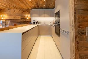 Η κουζίνα ή μικρή κουζίνα στο Brand new luxury appartement in morel 50 meters from the slopes +24 φωτογραφίες