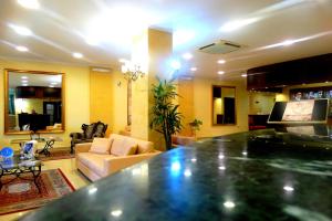 a living room with a large counter top in a living room at Hotel Orizzonte in Letojanni