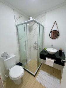 Ένα μπάνιο στο Flat da Fê in Buzios - 10 min a pé da Rua das Pedras +15 φωτογραφίες