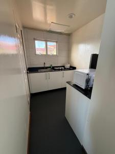 Kuchyň nebo kuchyňský kout v ubytování Southside Apartments