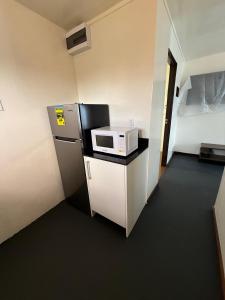Kuchyň nebo kuchyňský kout v ubytování Southside Apartments