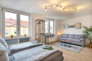 Χώρος καθιστικού στο Larooms - WhiteRock 1, zentrale Lage, tolle Anbindung