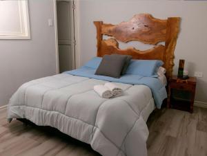 Postel nebo postele na pokoji v ubytování Casa Hotel Alicia Filandia