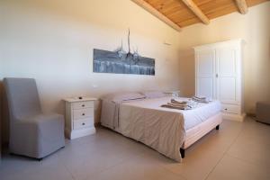 Postel nebo postele na pokoji v ubytování Il Monte Agriresort Copertino