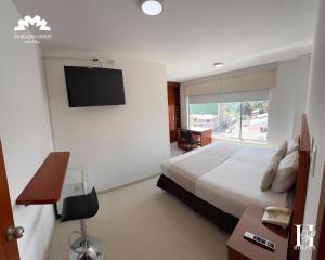 TV a/nebo společenská místnost v ubytování Hotel Dorado Gold