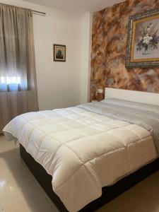 En eller flere senge i et værelse på Albatros + 22 billeder