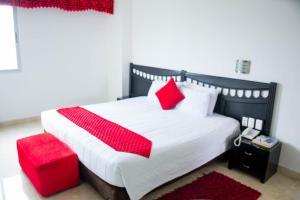 Postel nebo postele na pokoji v ubytování Hotel Suite Continental