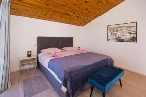 Postel nebo postele na pokoji v ubytování Apartments Nadi