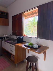 Η κουζίνα ή μικρή κουζίνα στο Flat 218 Pedra do Rodeadouro
