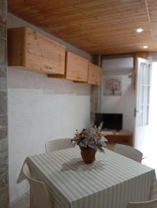 TV a/nebo společenská místnost v ubytování Casa vacanze Piazza Immacolata + 37 fotografií