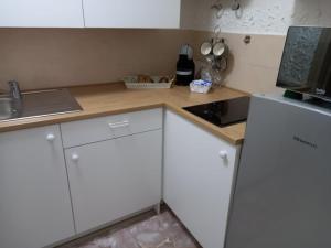 Kuchyň nebo kuchyňský kout v ubytování Casa vacanze Piazza Immacolata