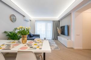 Et tv og/eller underholdning på Cortina North Premium Smart Apartment with Parking