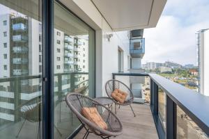 En balkon eller terrasse på Cortina North Premium Smart Apartment with Parking