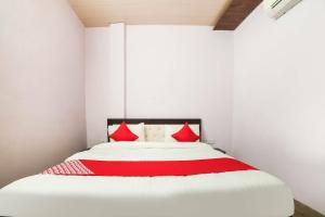 Postel nebo postele na pokoji v ubytování Hotel O Iris Lite