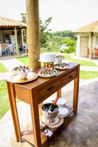 a table with cupcakes on top of it at Espaço Amplitude in Sobradinho